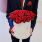 imgi_67_men-s-hands-hold-bucket-red-roses-bucket_75916-942 1
